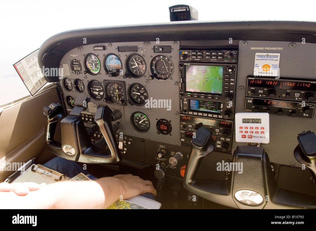 Picture of: Interior of a modern Cessna  airplane with GPS and autopilot